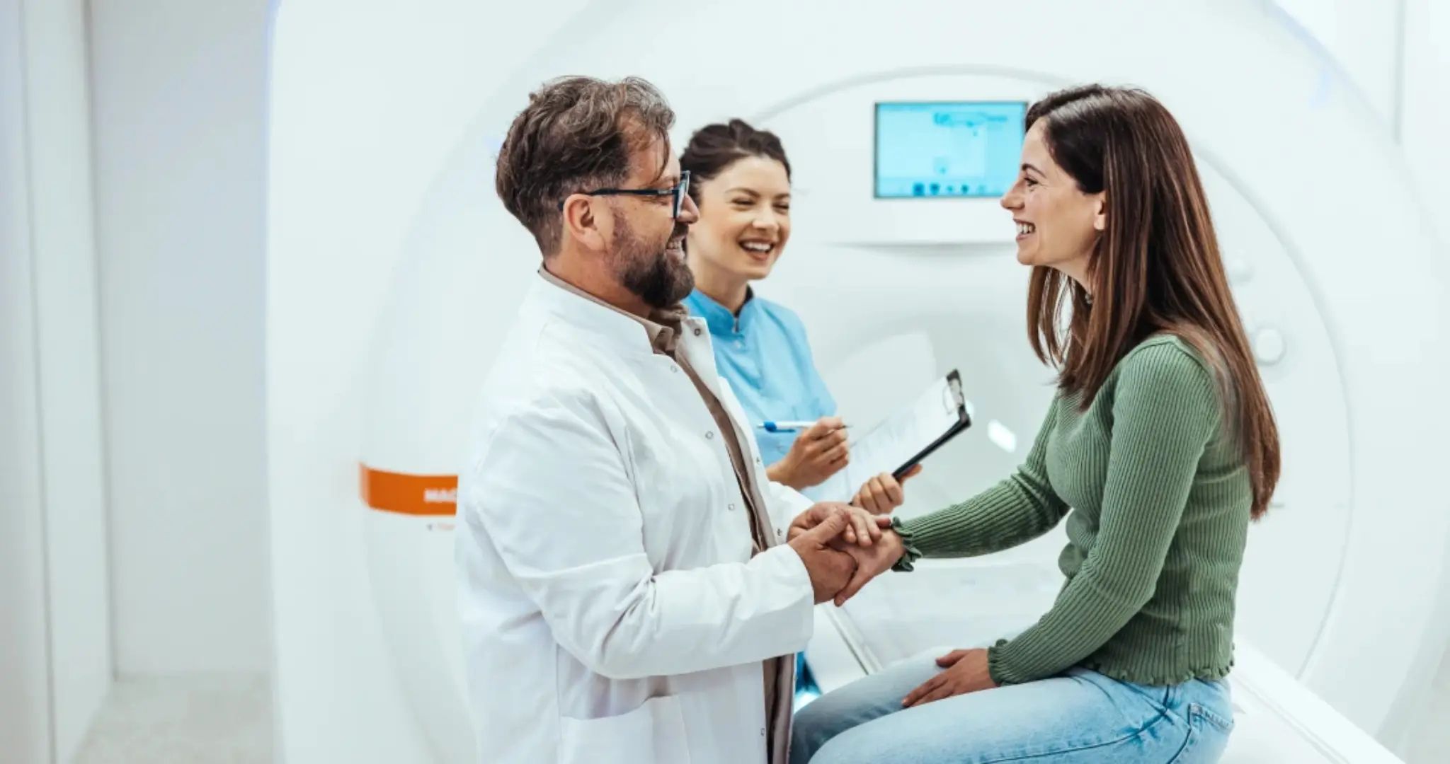 Doctor and patient smiling during consultation.