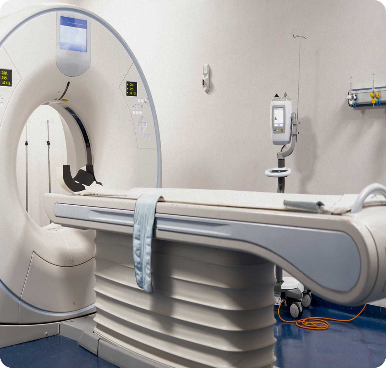 CT scanner in a hospital examination room.
