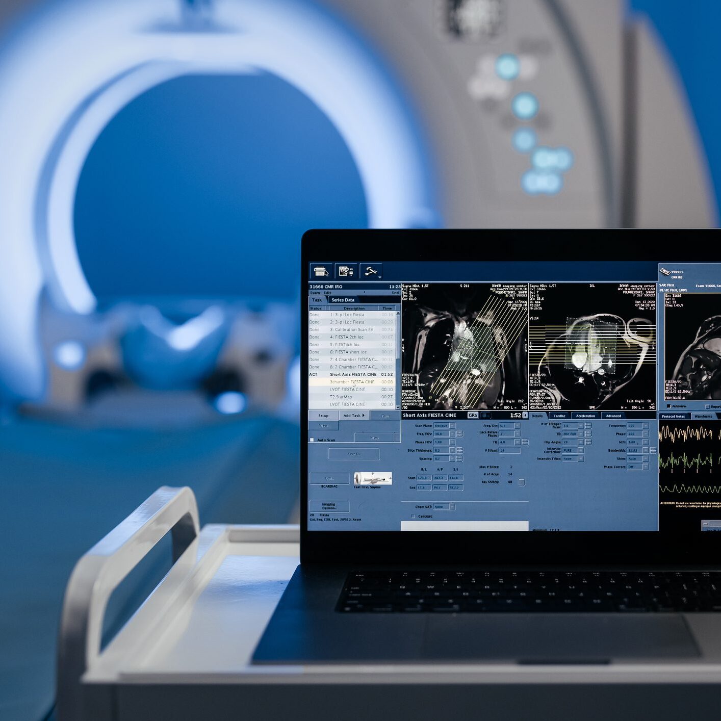In the MRI or CT control room, the brain scan results are displayed on the monitor